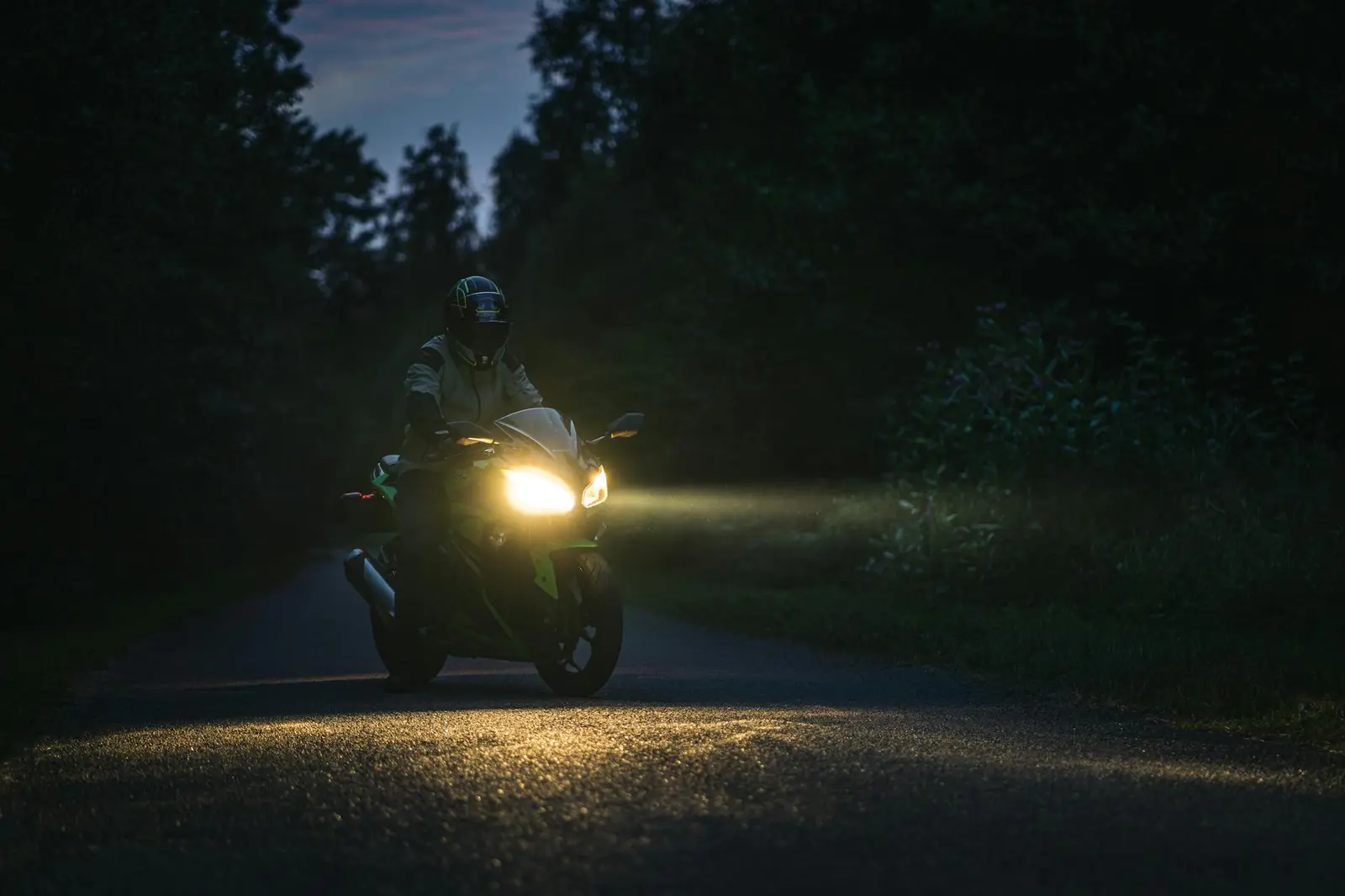 Night rider with illuminated helmet